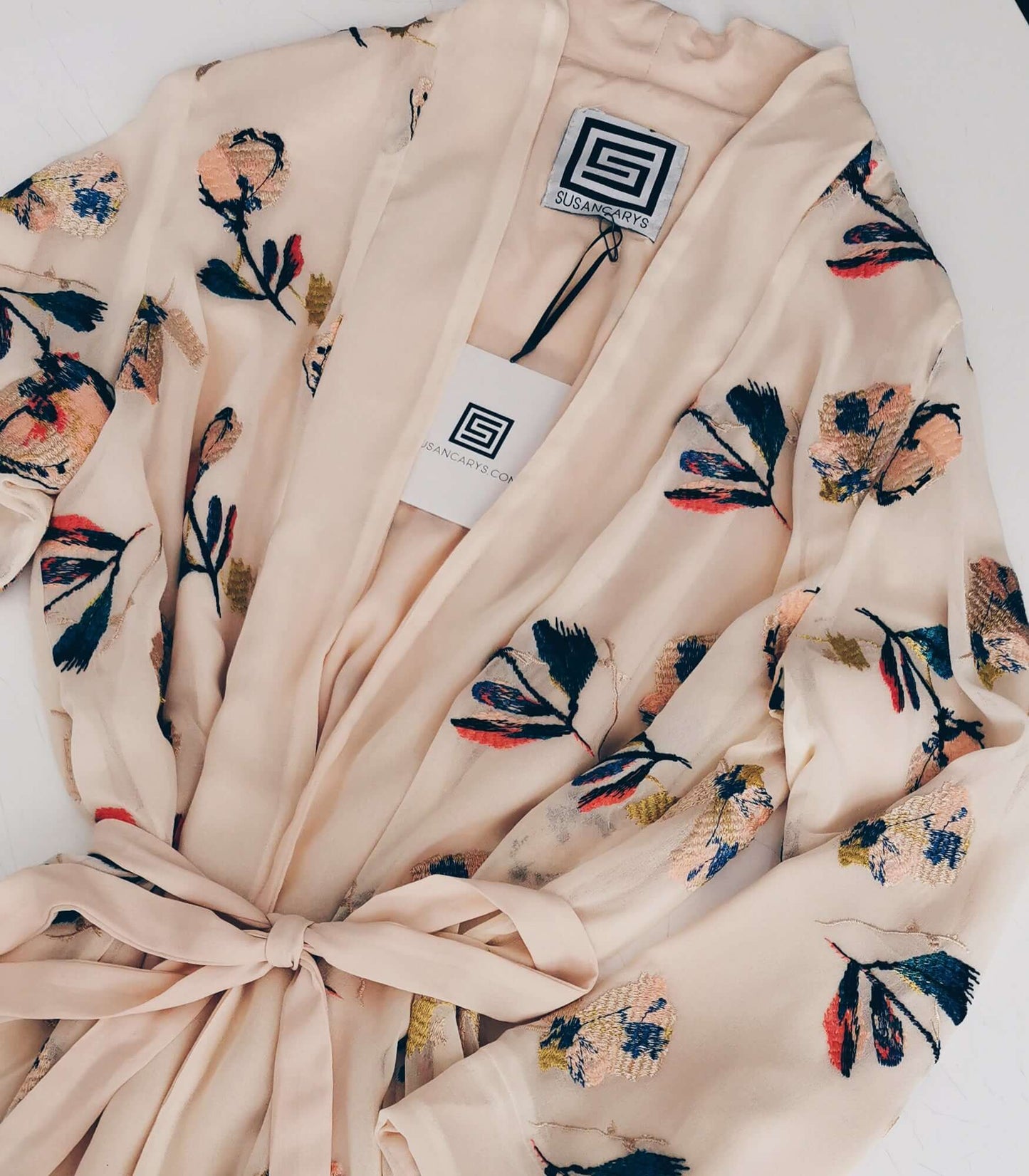 An elegant floral print long coat